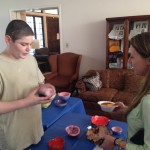 Mike DelGiorno, Astor resident and potter, speaks to staff about crafting ceramic chili bowls for the annual Chili Bowl Fest