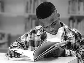 teen boy reading